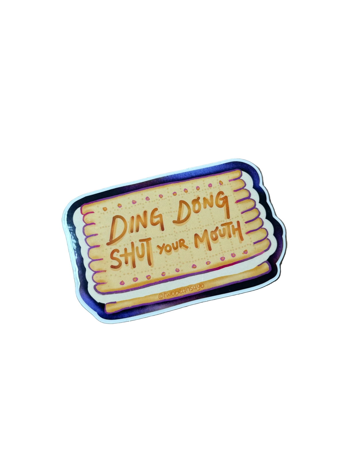 A die-cut sticker shaped like a biscuit with the text 'DING DONG SHUT YOUR MOUTH' 